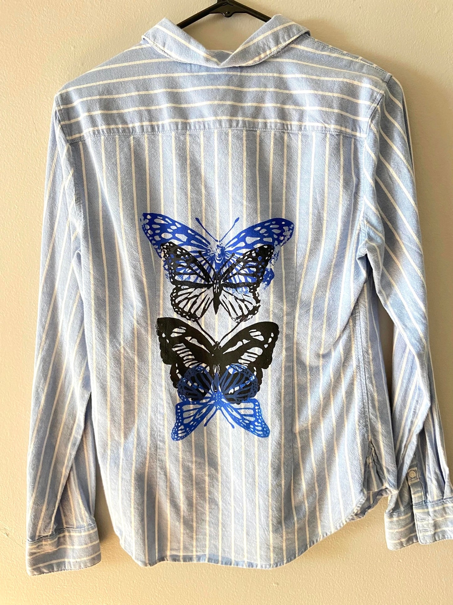 blue & black butterfly button shirt